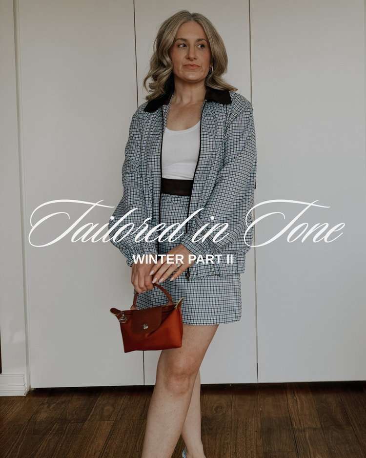 Model wearing The Tailored Crop by By Bel in a blush heritage tartan with a structured fit and square neckline.