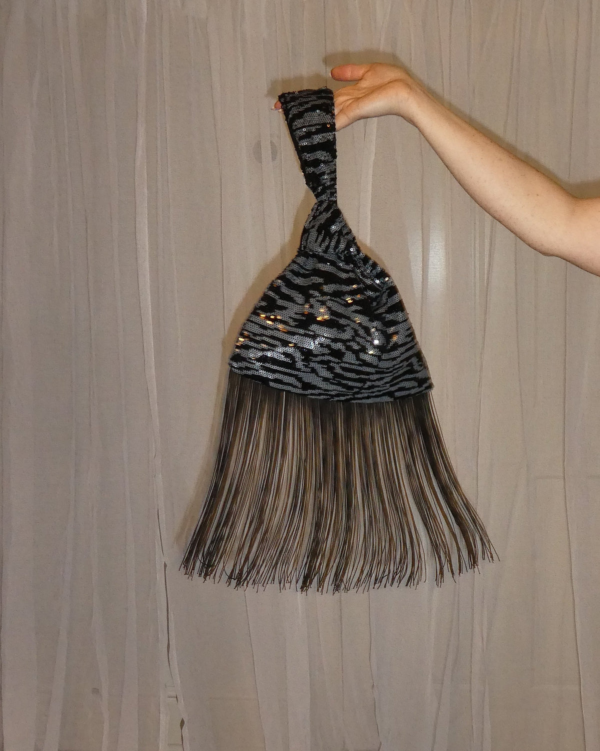 zebra sequin knot bag