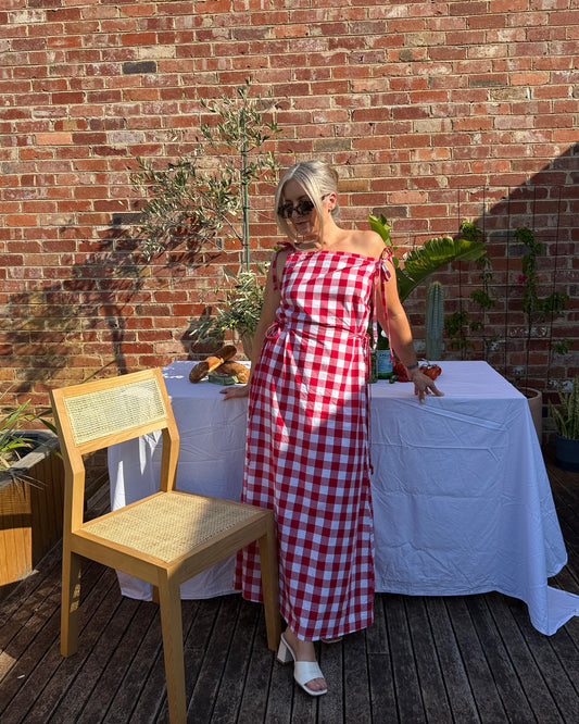 By Bel Trattoria red gingham maxi dress with flowing silhouette styled for Mediterranean summer long lunch.