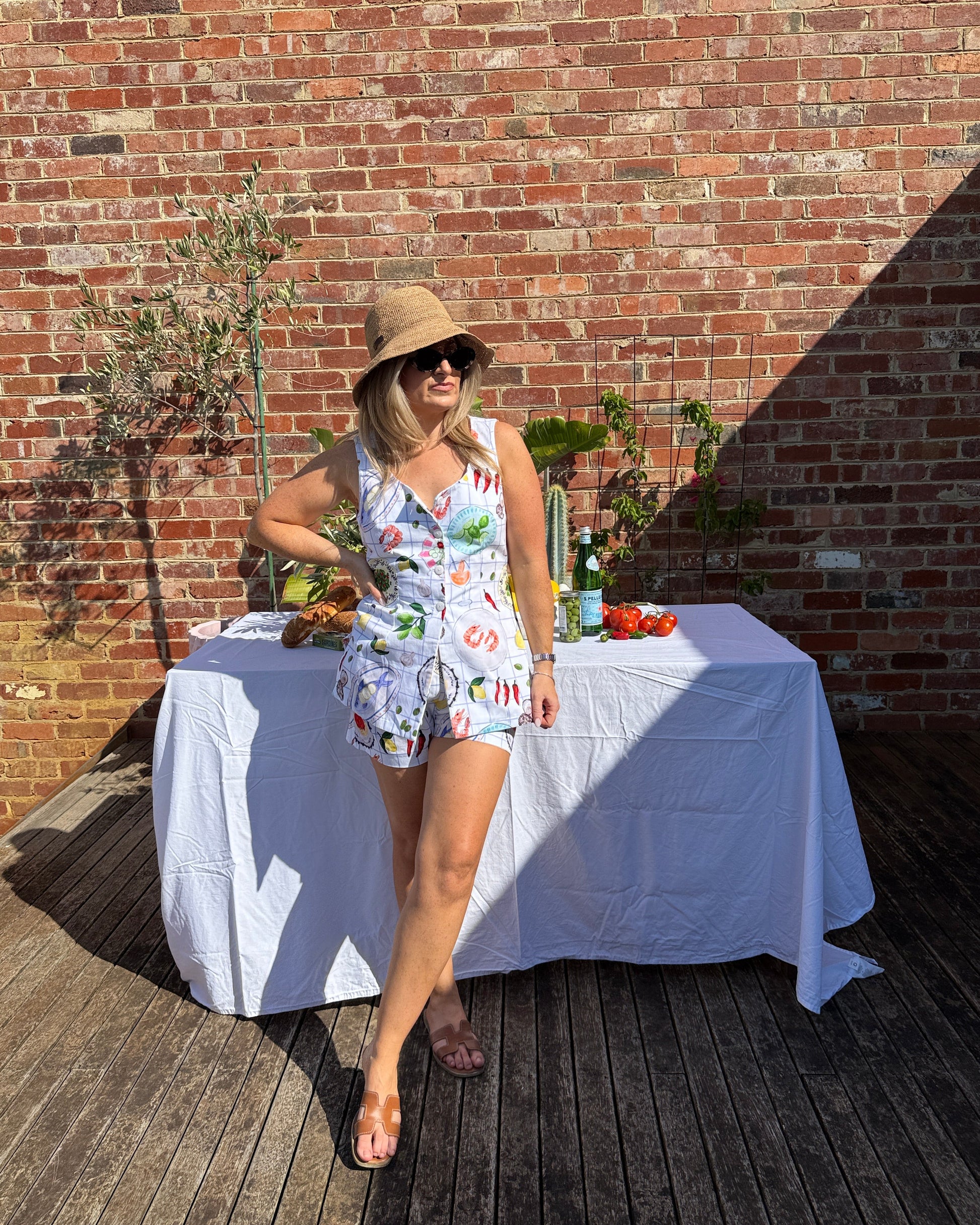 European summer outfit featuring Aperitivo print top styled for long lunch and aperitivo
